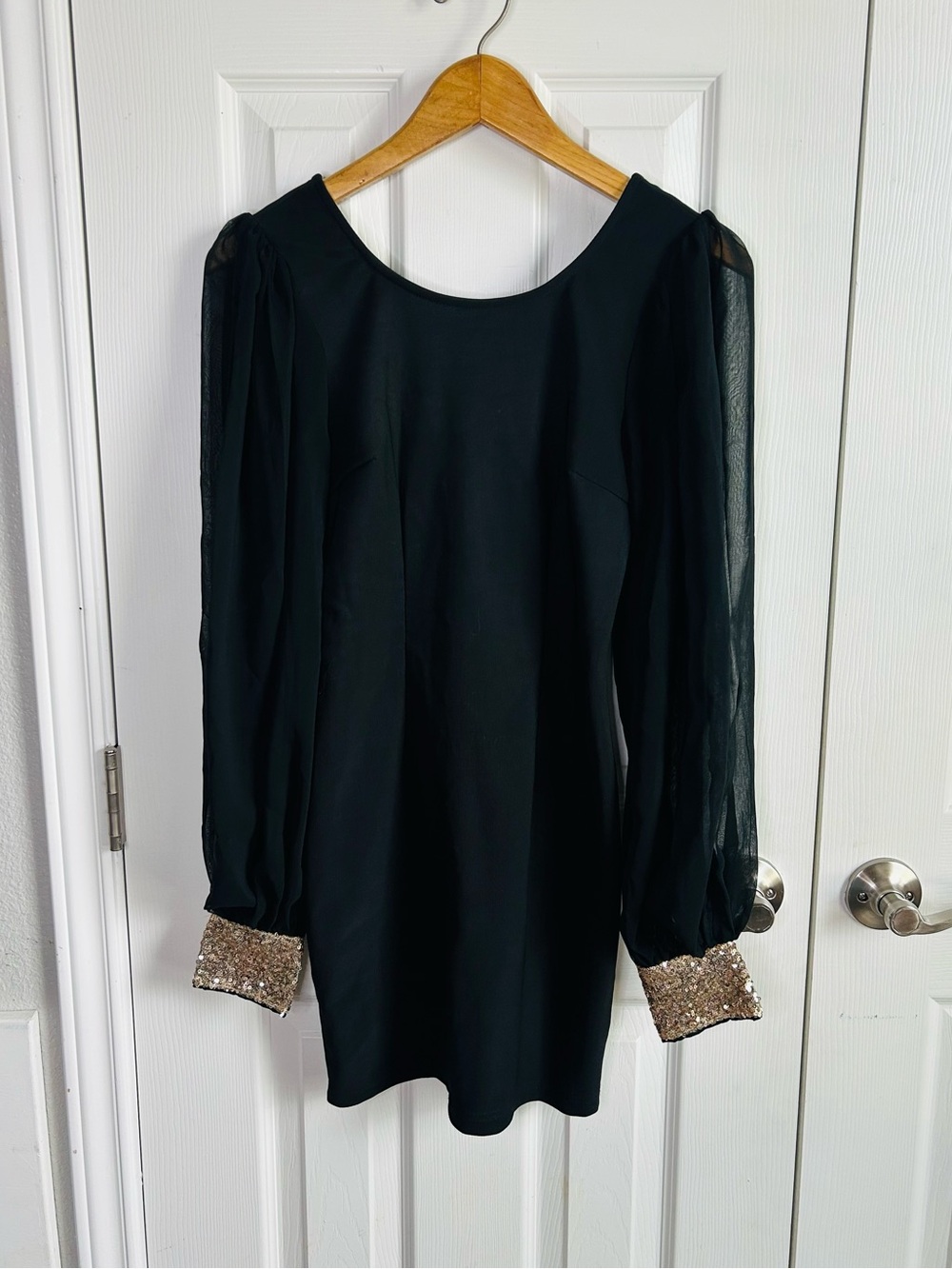 black mini dress sheet long sleeves w/ gold sequin cuffs, open back